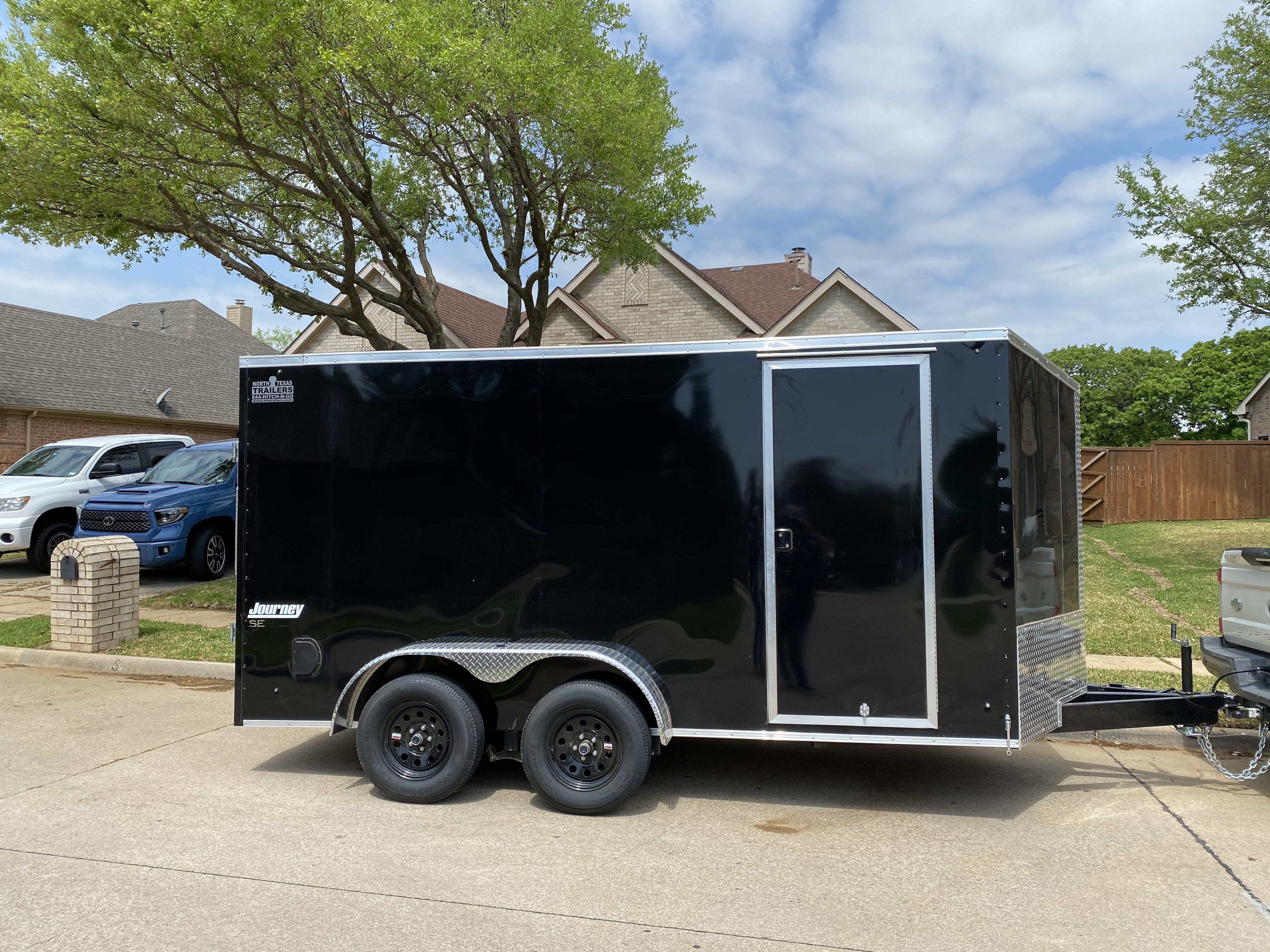 7x14 enclosed cargo trailer - black Journey SE enclosed trailer for rent in Justin TX
